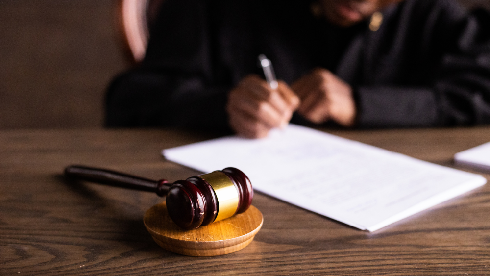 Court ruling documents beside a gavel, representing the Stephen Stepaniuk update following dismissal of charges.
